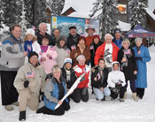 Group posing with Olympic Torch
